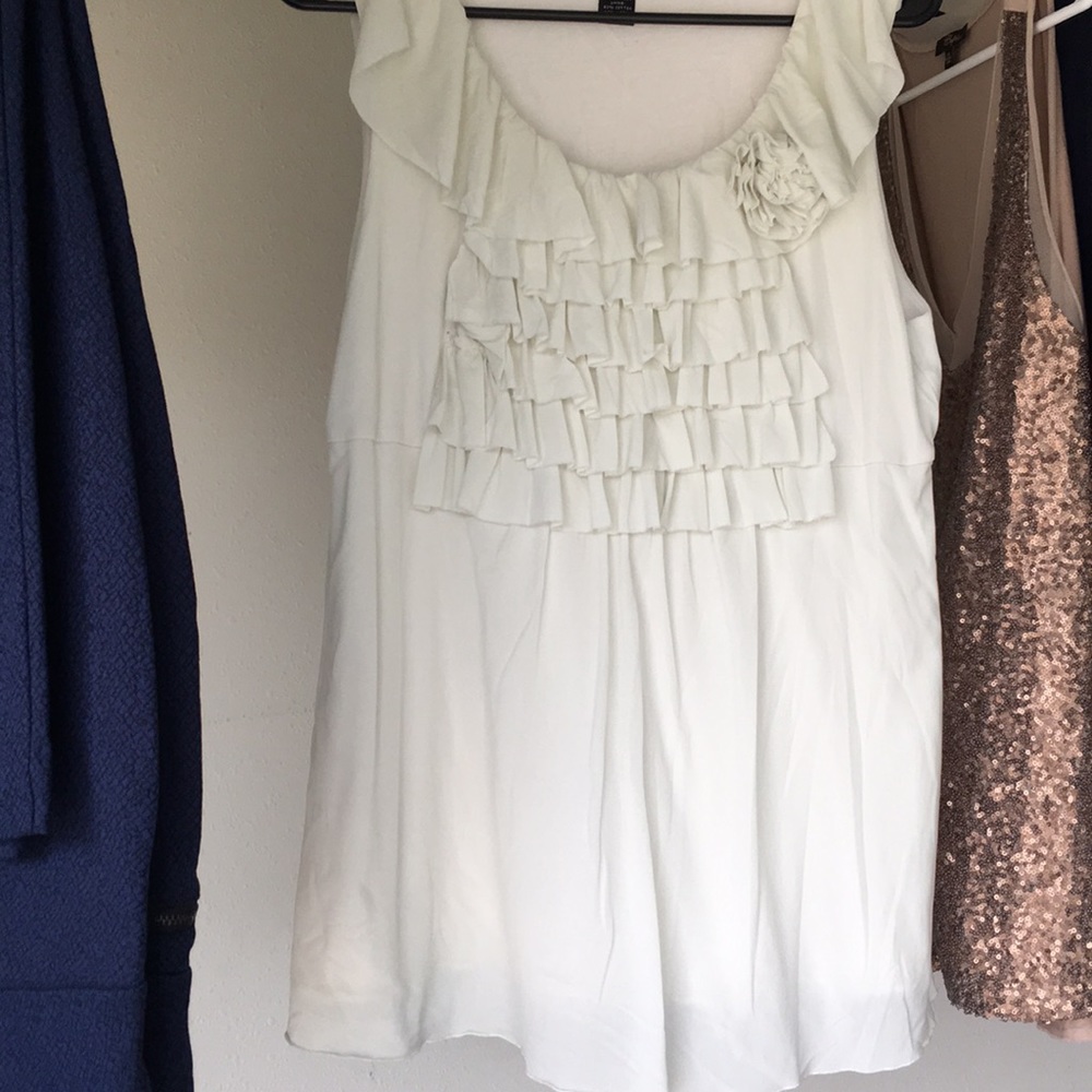 White sleeveless ruffle top